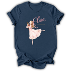 A navy blue short-sleeve t-shirt with a graphic print of a ballerina in a pink dress and the text 'Clara The Nutcracker'.
