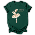 A dark green short-sleeve t-shirt with a graphic of a ballerina playing a flute, accompanied by the text 'Mirlitons STOP HUTCHACKER' in a vintage font.