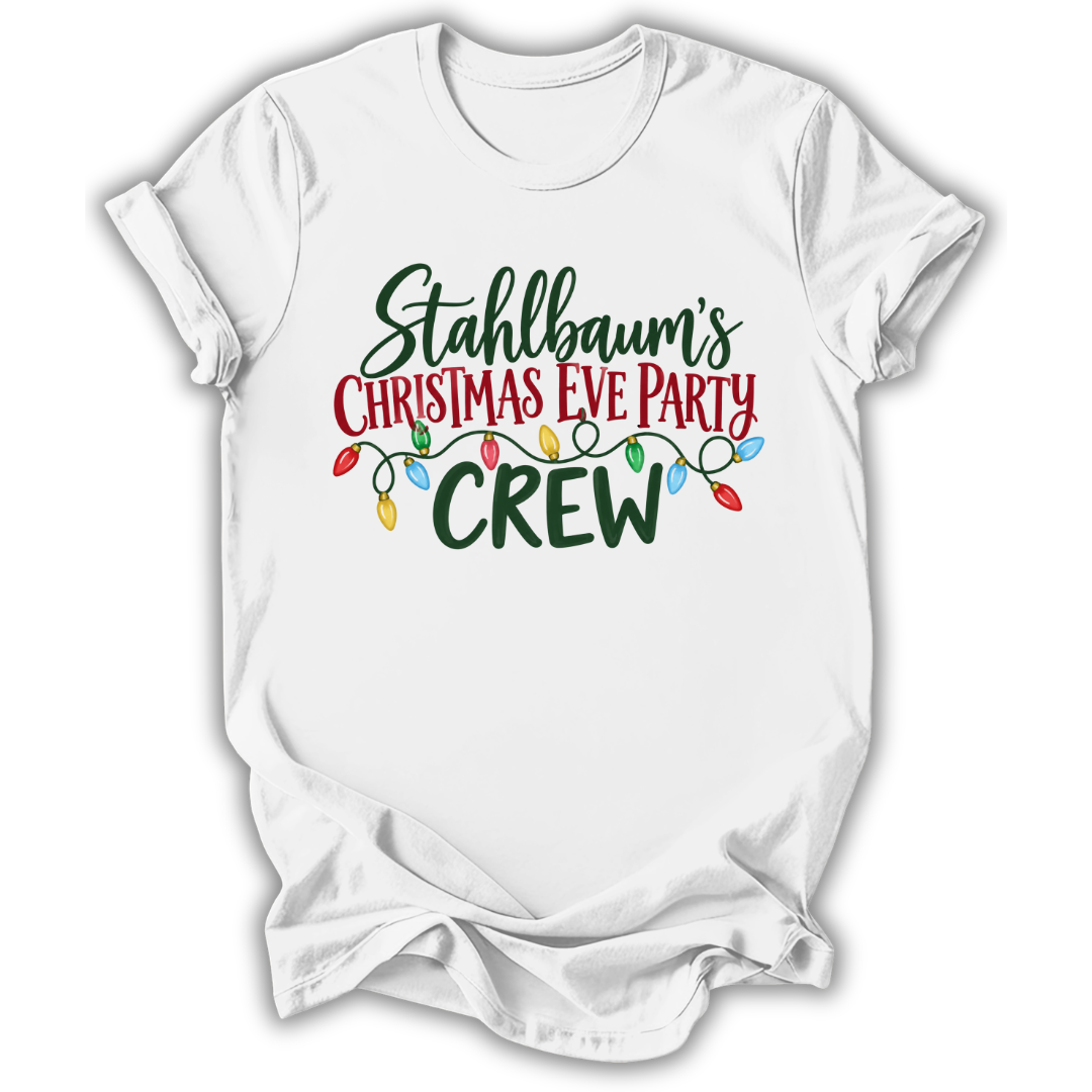 A white short-sleeve crewneck t-shirt with a graphic print reading 'Stahlbaum's Christmas Eve Party CREW' in green and red lettering, decorated with a string of multicolored Christmas lights.