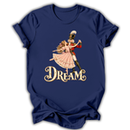 A navy blue short-sleeve t-shirt with a vintage-style graphic of a dancing couple and the word 'DREAM' in ornate gold lettering on the front.