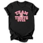 A black short-sleeve crewneck t-shirt with a pink graphic on the front reading 'TEAM TIGHTS OVER' in varsity-style lettering, with a pink ribbon motif in the center, shown on a plain white background.