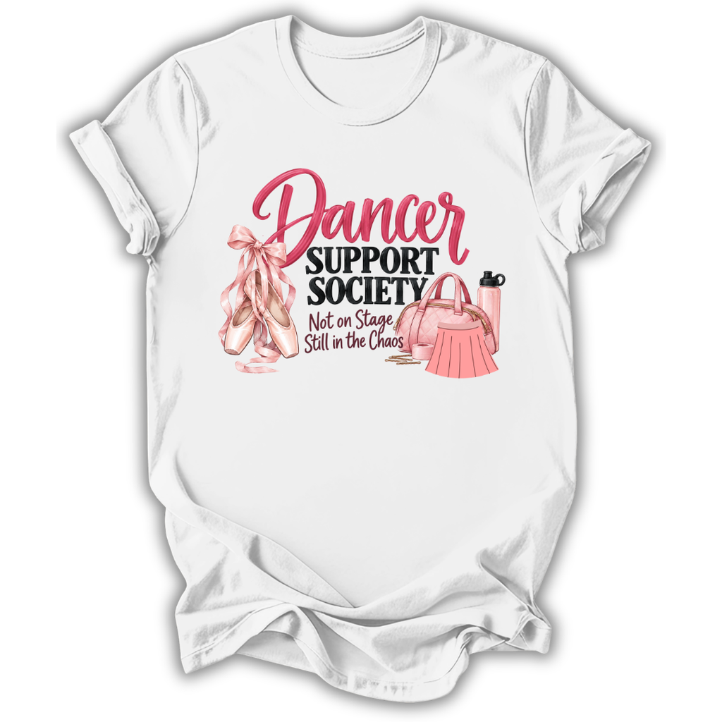 A white short-sleeve t-shirt with a graphic print on the front that reads 'Dancer Support Society Not on Stage Still in the Chaos' in pink and black lettering, accompanied by illustrations of pink ballet slippers, a pink handbag, and a pink water bottle.