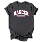 A dark charcoal gray t-shirt with a graphic on the chest that reads 'DANCER SUPPORT DEPT.' in white and pink, displayed on a clean white background.