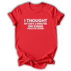 A red short-sleeve crewneck t-shirt with white text on the front reading 'I THOUGHT MY KID'S 3 MINUTES ON STAGE WOULD BE LONGER'. The t-shirt is shown against a plain white background with a soft drop shadow.