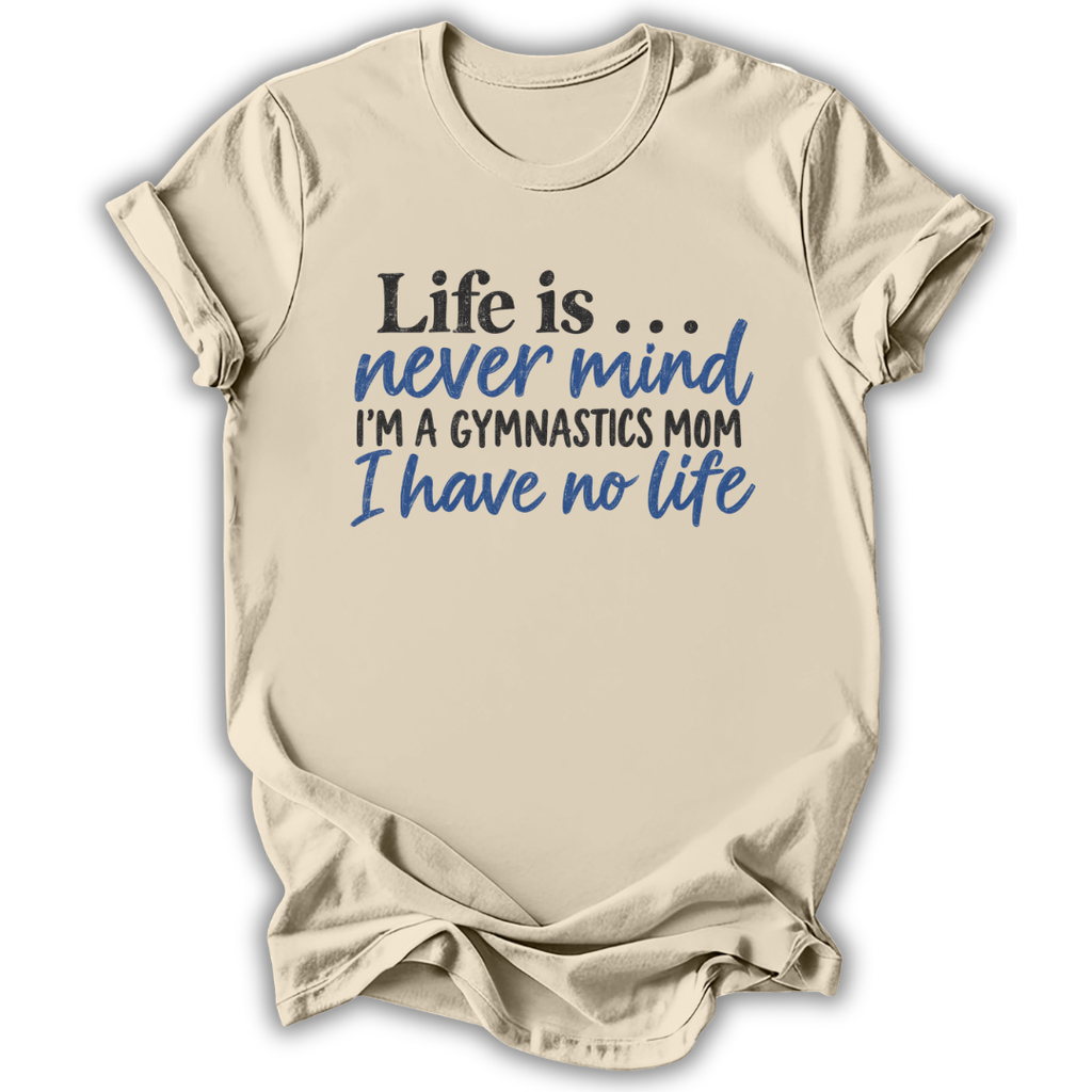 A beige short-sleeve t-shirt with a humorous gymnastics-themed graphic printed on the front. The text reads 'Life is.