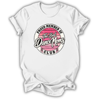 A white short-sleeve crewneck t-shirt with a circular graphic on the chest that reads 'PROUD MEMBER OF The Bad Dance Moms CLUB'. The graphic features a pink striped circle in the center with white script lettering and black text.
