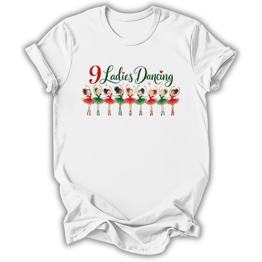 A white short-sleeve crewneck t-shirt with a graphic print on the front that reads '9 Ladies Dancing' in red and green script above a row of nine cartoon ballerinas in red and green tutus, shown on a plain white background.