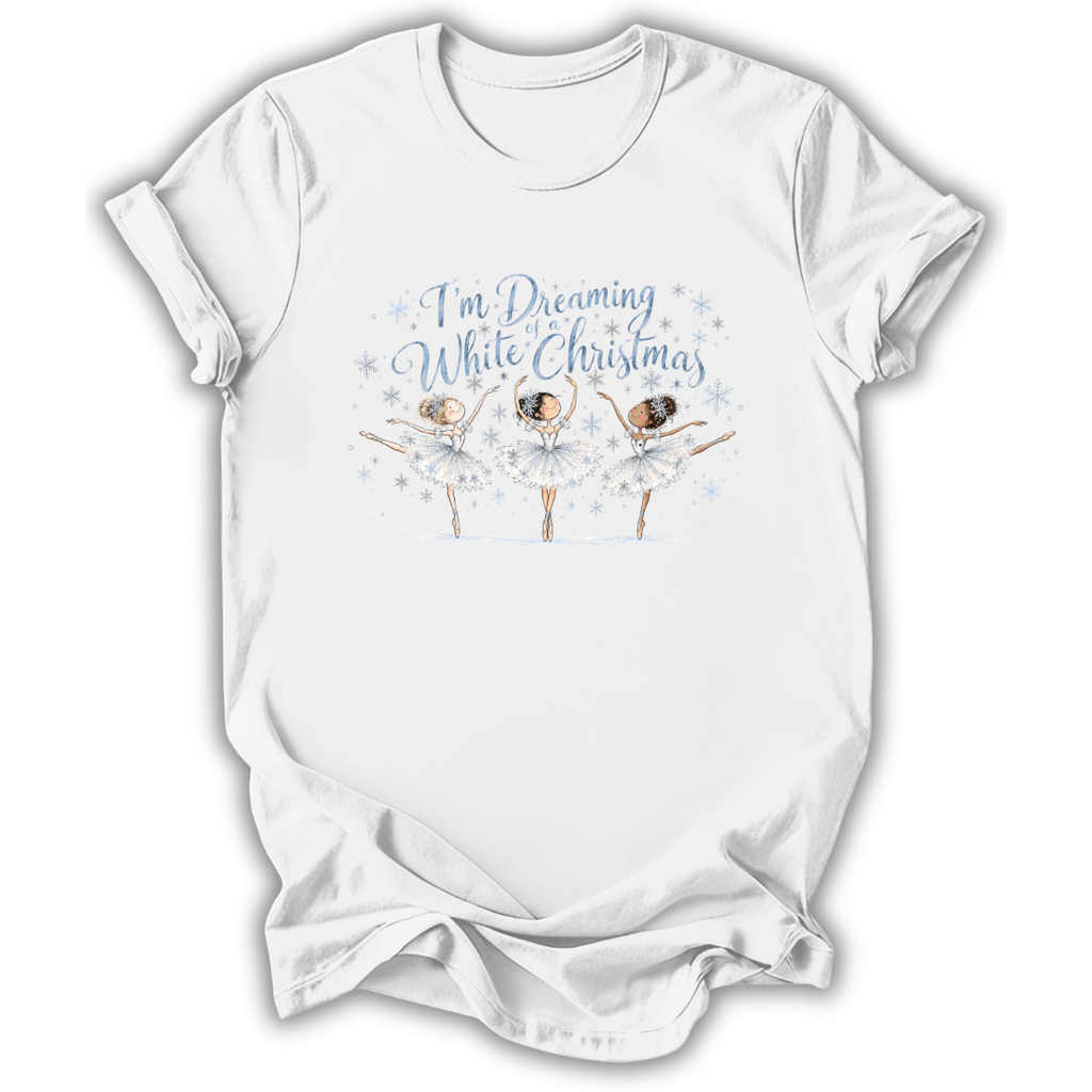 A white short-sleeve t-shirt with a graphic print of three ballerinas and the text 'I'm Dreaming While Christmas' in blue and white, displayed on a clean white background.