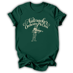 A forest green short-sleeve t-shirt printed with the “Orchestra Pit Crew” Nutcracker graphic design.