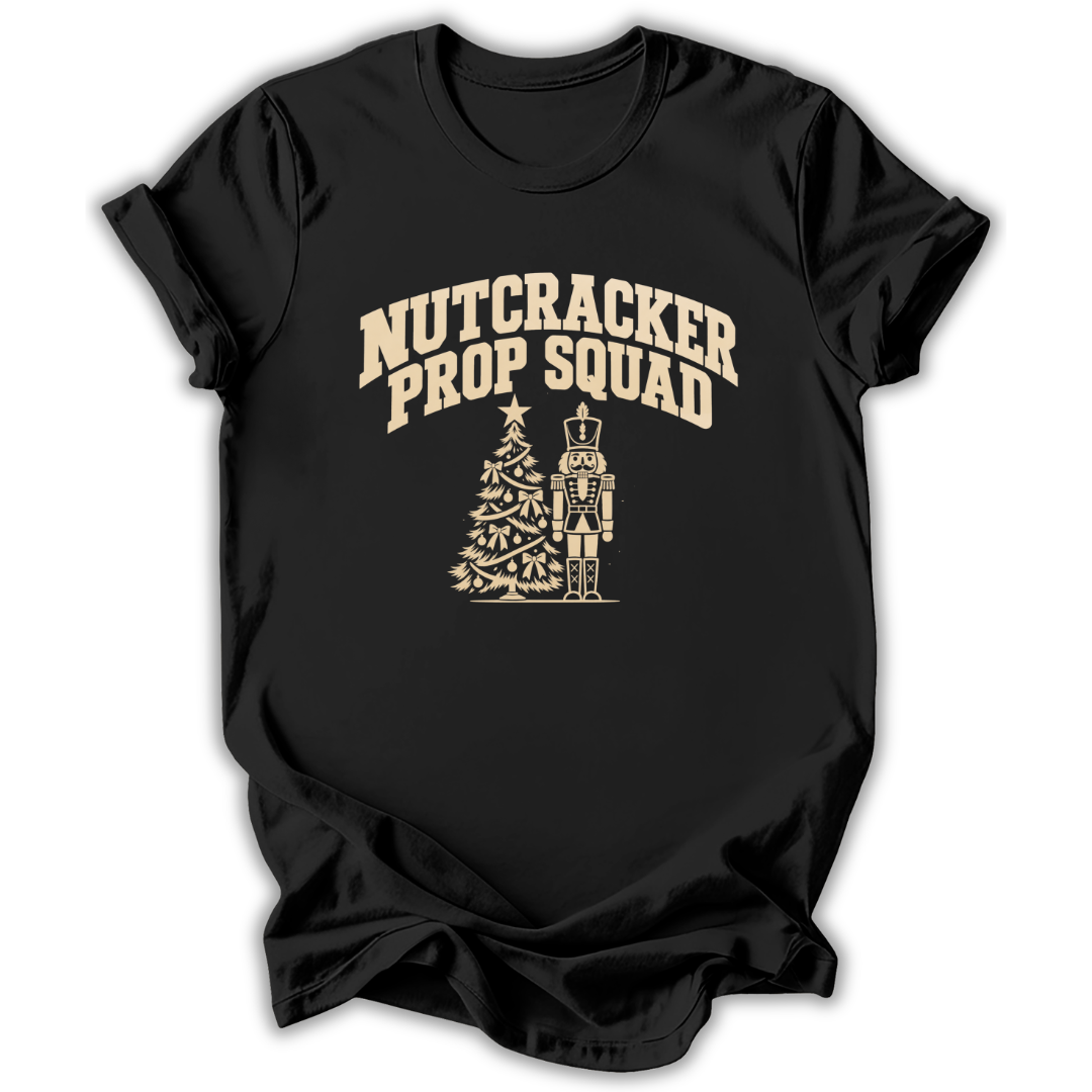 A black short-sleeve t-shirt printed with the “Nutcracker Prop Squad” graphic design.
