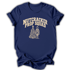 A navy short-sleeve t-shirt printed with the “Nutcracker Prop Squad” graphic design.
