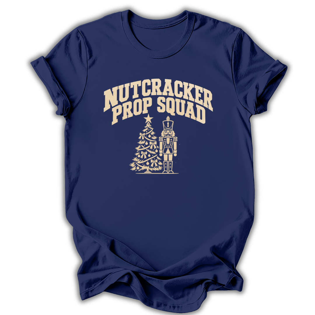 A navy short-sleeve t-shirt printed with the “Nutcracker Prop Squad” graphic design.