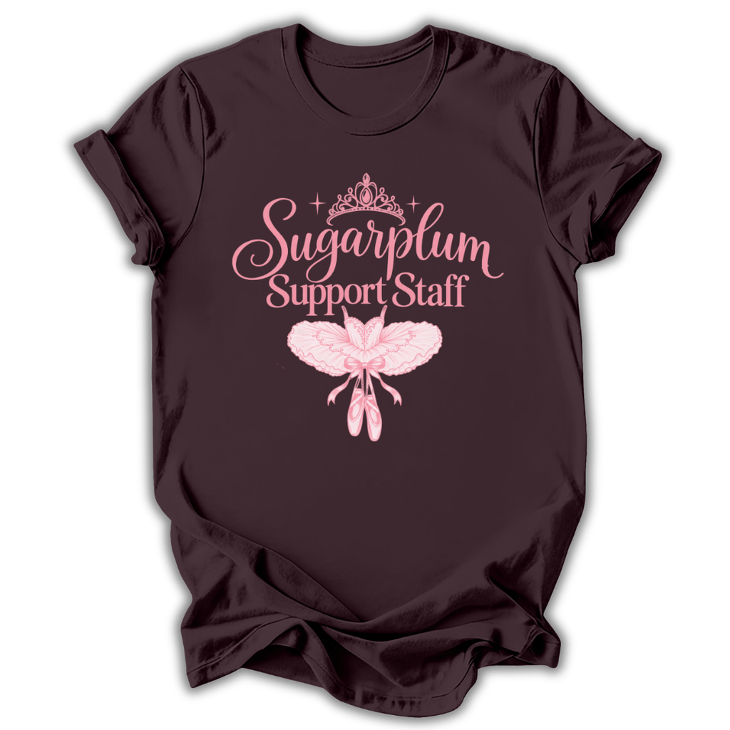 A dark chocolate brown short-sleeve t-shirt printed with the “Sugarplum Support Staff” Nutcracker graphic design.