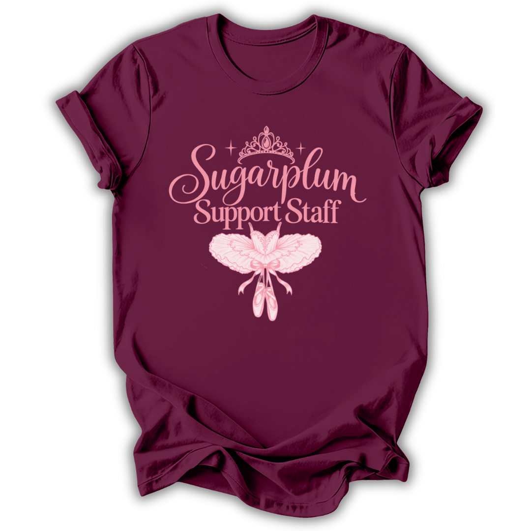 A maroon short-sleeve t-shirt printed with the “Sugarplum Support Staff” Nutcracker graphic design.
