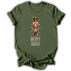 A military green short-sleeve t-shirt printed with the “Merry & Bright Nutcracker” graphic design.