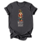 A dark heather gray short-sleeve t-shirt printed with the “Merry & Bright Nutcracker” graphic design.