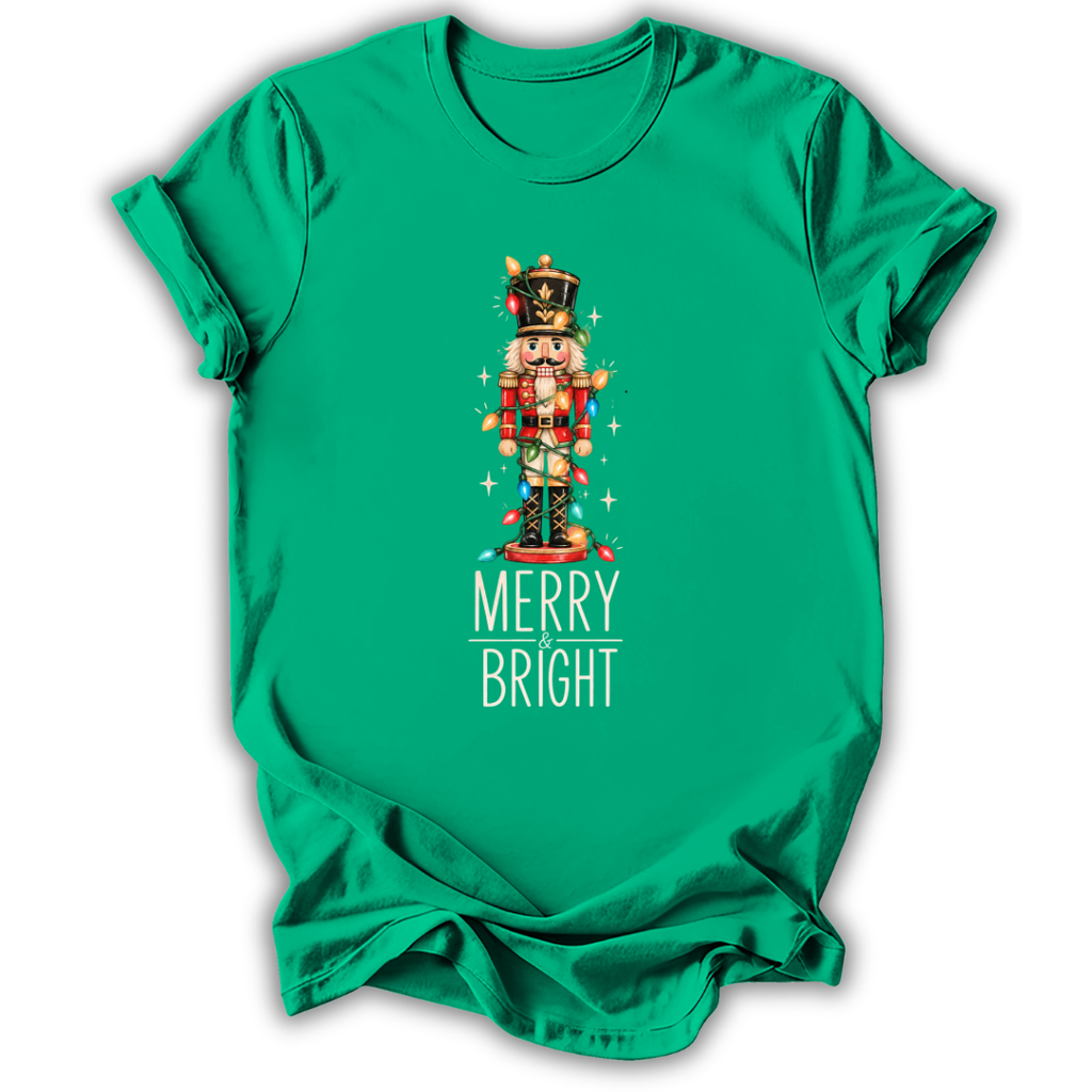 A kelly green kids' short-sleeve t-shirt printed with the “Merry & Bright Nutcracker” graphic design.