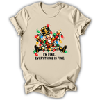 A natural cream short-sleeve t-shirt printed with the “I’m Fine Nutcracker” graphic design.