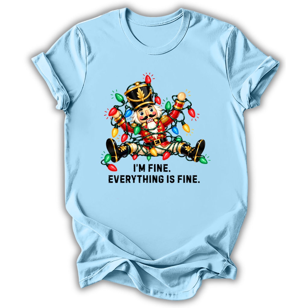 A light blue short-sleeve t-shirt printed with the “I’m Fine Nutcracker” graphic design.