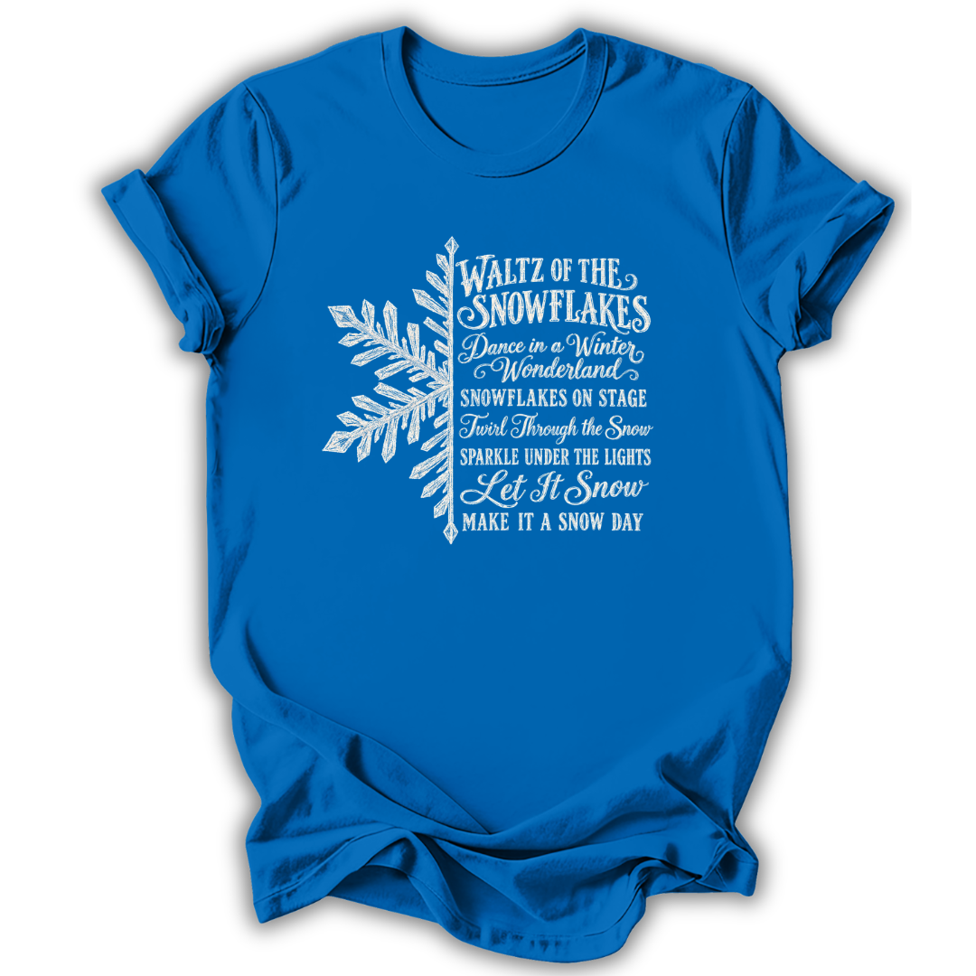 A royal blue short-sleeve t-shirt printed with the “Nutcracker Snowflakes” graphic design.