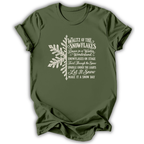 A military green short-sleeve t-shirt printed with the “Nutcracker Snowflakes” graphic design.