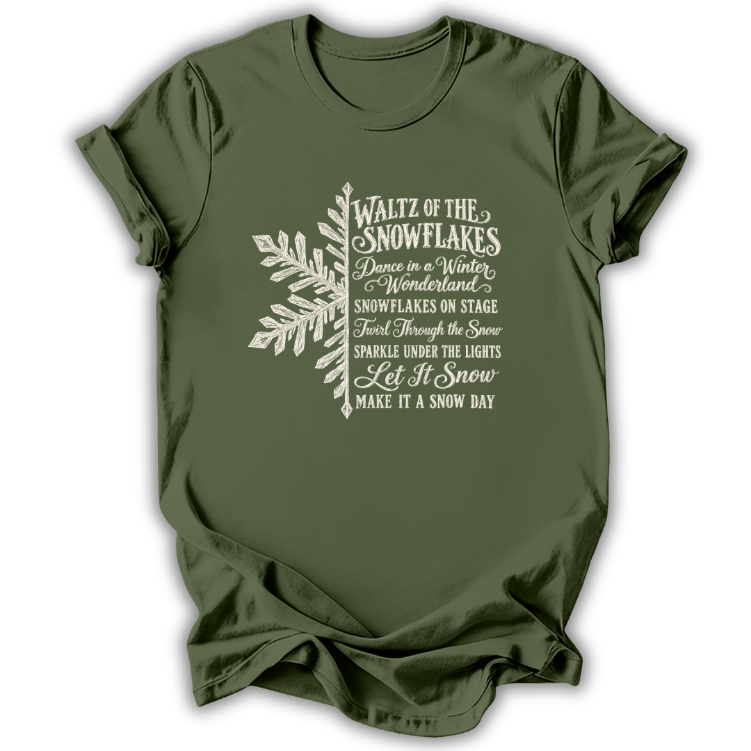 A military green short-sleeve t-shirt printed with the “Nutcracker Snowflakes” graphic design.