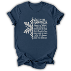 A heather navy short-sleeve t-shirt printed with the “Nutcracker Snowflakes” graphic design.