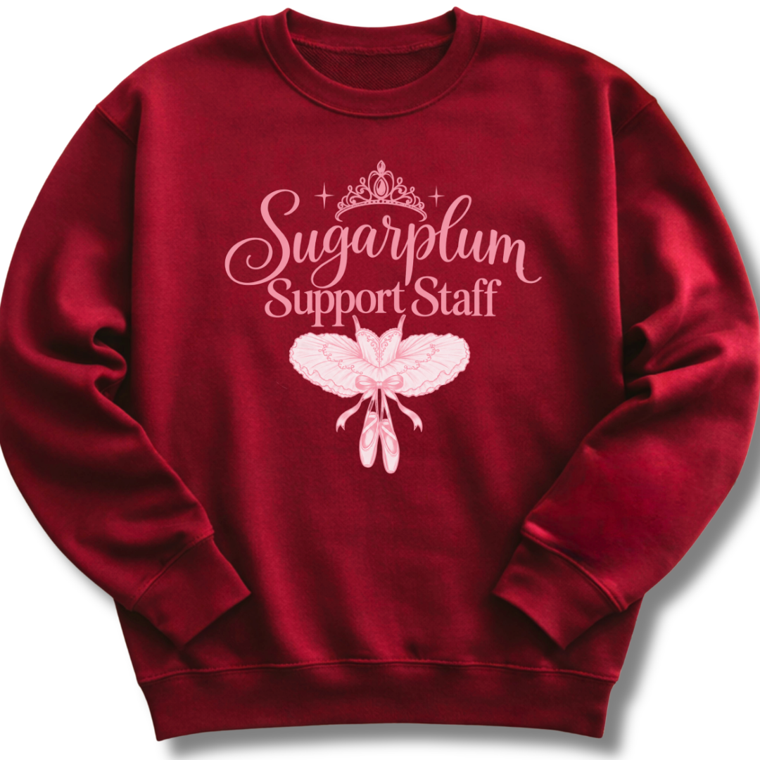 A maroon crewneck sweatshirt featuring pink 'Sugarplum Support Staff' lettering with a delicate floral design.