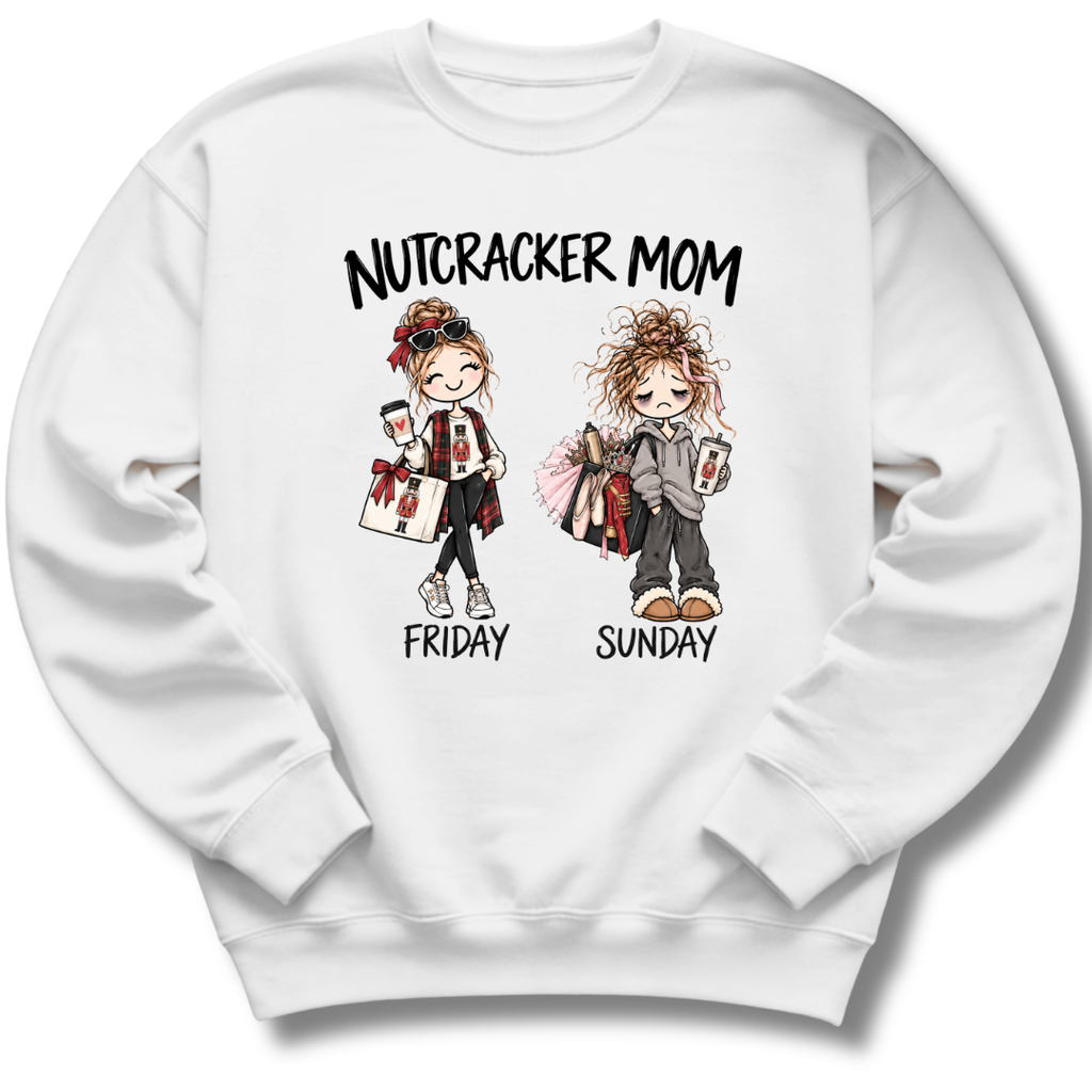A white crewneck sweatshirt featuring an illustrated 'Nutcracker Mom' design with two characters, one ready for Friday's performance and one twirling into Sunday.