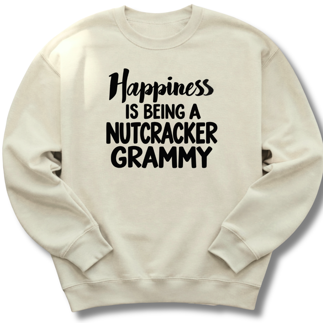A sand-colored crewneck sweatshirt featuring a 'Happiness Is Being a Nutcracker Grammy' holiday design.