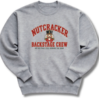 A heather gray crewneck sweatshirt featuring a vintage-inspired nutcracker with 'Backstage Crew' lettering.