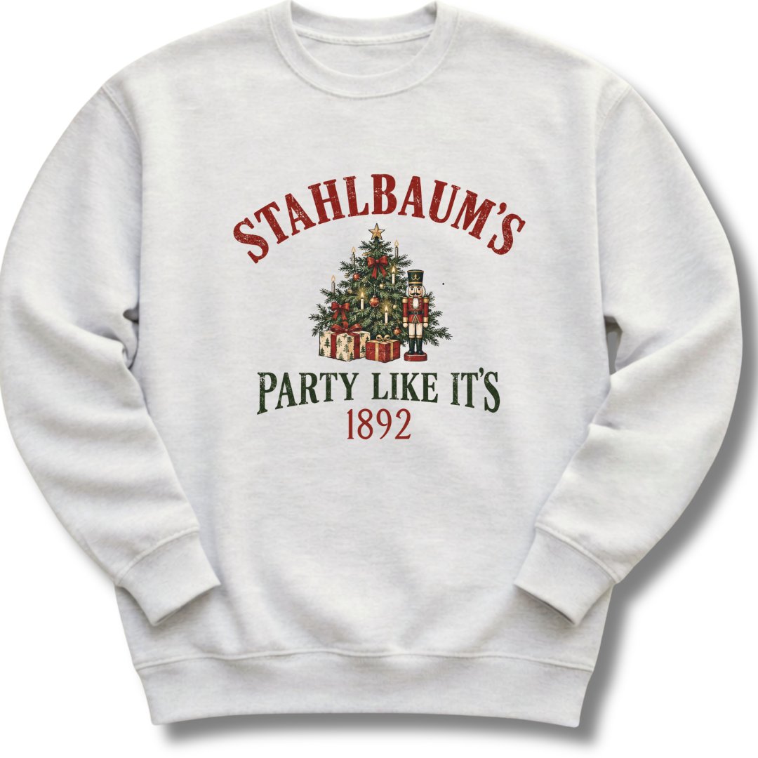 A light ash gray crewneck sweatshirt featuring a vintage-inspired Christmas tree with the message 'Stahlbaum's Party Like It's 1892'.