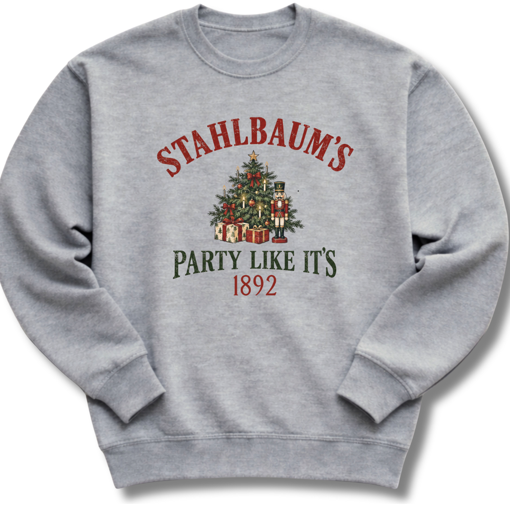 A heather gray crewneck sweatshirt featuring a vintage-inspired Christmas tree with the message 'Stahlbaum's Party Like It's 1892'.