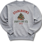 A heather gray crewneck sweatshirt featuring a vintage-inspired Christmas tree with the message 'Stahlbaum's Party Like It's 1892'.