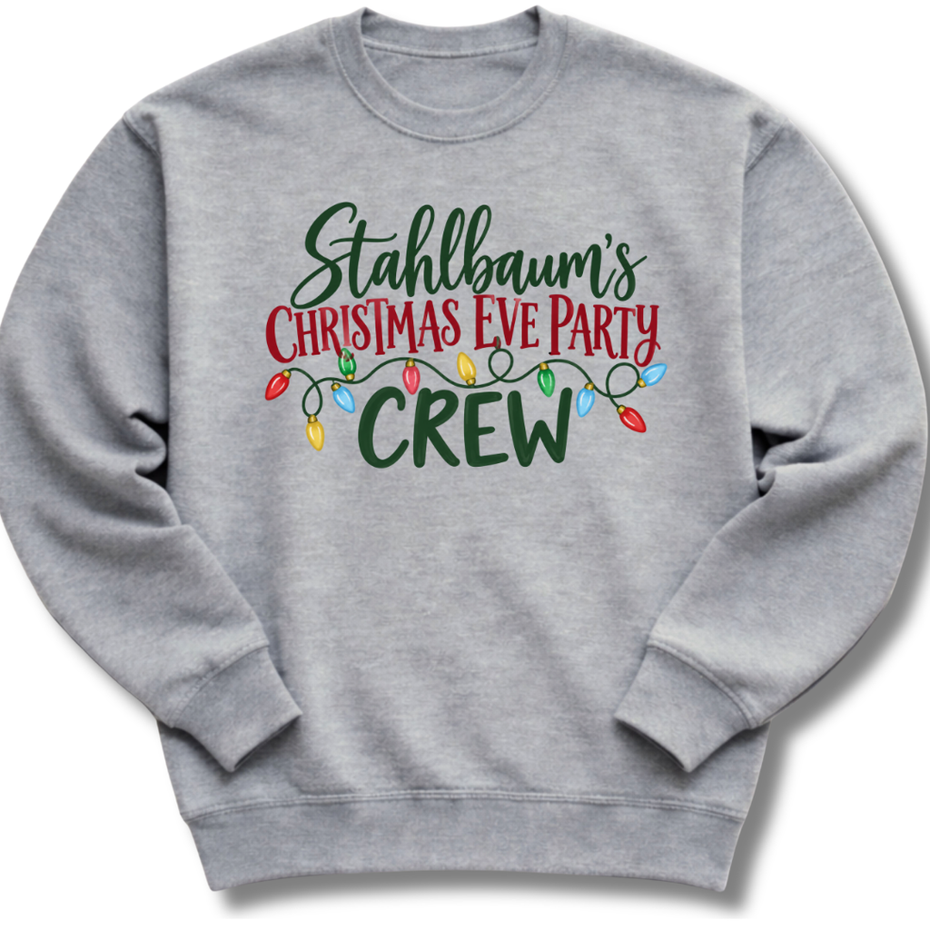 A heather gray crewneck sweatshirt featuring festive 'Stahlbaum's Christmas Eve Party Crew' lettering accented with colorful holiday lights.