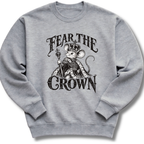 A heather gray crewneck sweatshirt featuring a crowned, sword-bearing mouse in detailed black artwork beneath the words 'FEAR THE CROWN'.