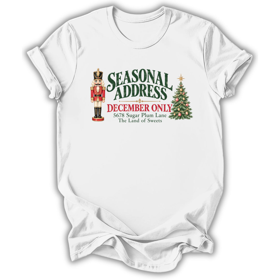 A white short-sleeve t-shirt printed with the “Seasonal Address” graphic design.