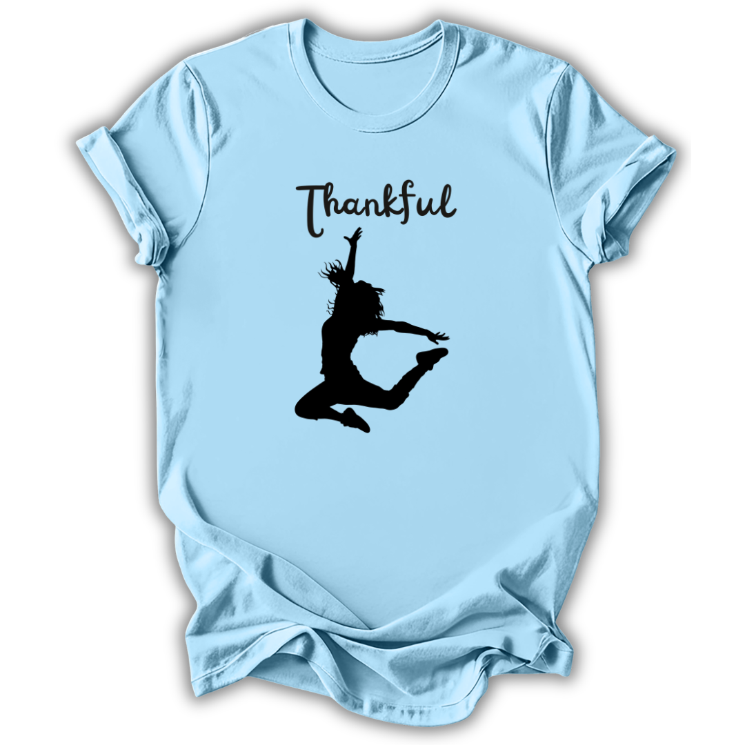 Light blue kids' t-shirt with the Thankful Dancer design