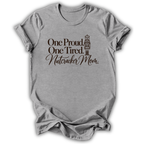 A heather gray short-sleeve t-shirt printed with the “Proud & Tired Nutcracker Mom” graphic design.