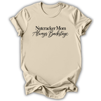 A natural cream short-sleeve t-shirt printed with the “Nutcracker Mom Backstage” graphic design.