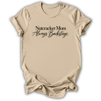 A sand beige short-sleeve t-shirt printed with the “Nutcracker Mom Backstage” graphic design.