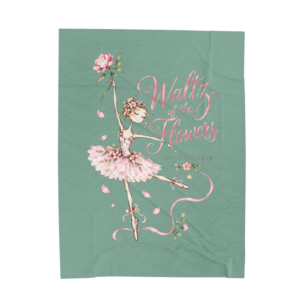 A rectangular fabric item, likely a tea towel or blanket, featuring a pastel illustration of a ballerina in a pink tutu holding a rose, with the text 'Waltz of the Flowers' and 'The Butterfly' on a sage green background.